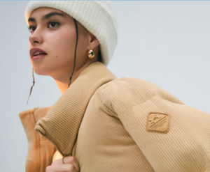 Under Armour - woman in puffer jacket